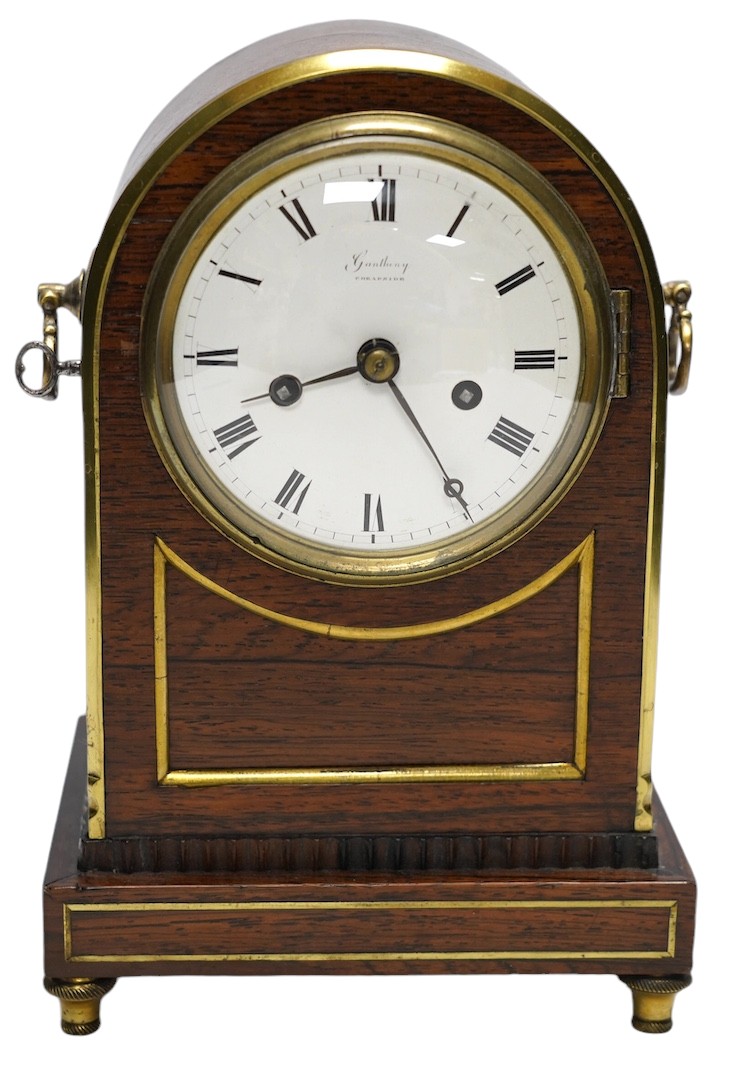 A rosewood brass inlaid eight day mantel clock with enamel dial inscribed Gantheny, Cheapside, with pendulum, no key, 22cm high. Condition - fair to good, not tested as working